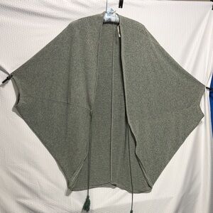 Easel  Green poncho